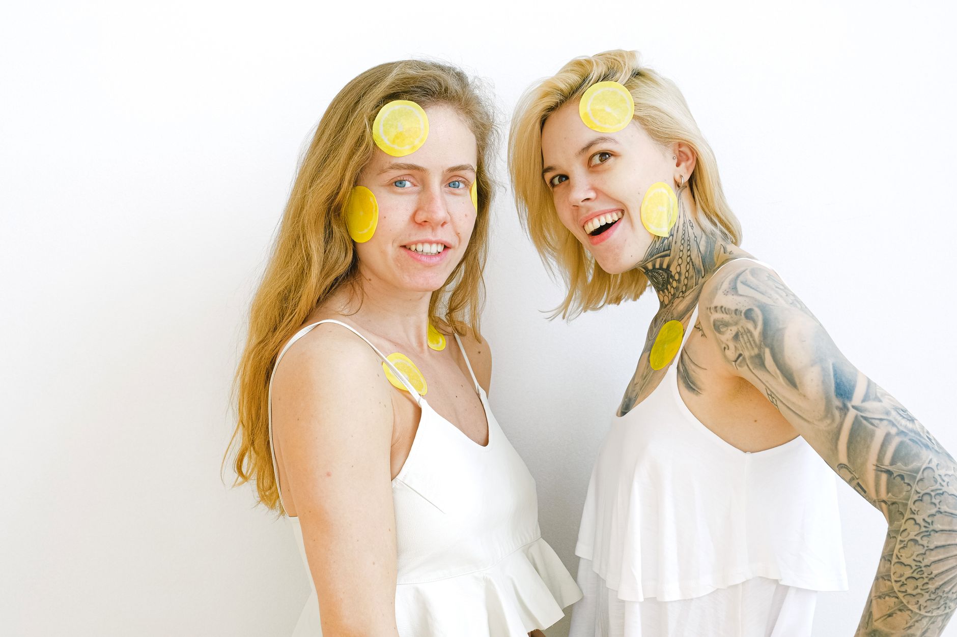 Woman holding a fresh lemon, representing the shift in pleasure and body awareness in your 30s